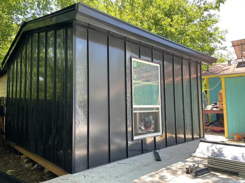 Black standing seam metal wall panels for Roof Inspection in Middlesex